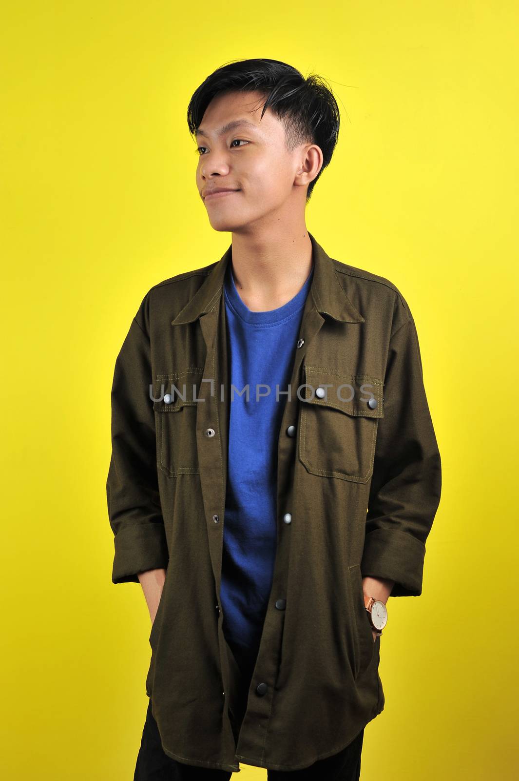 Confidence Asian young man wear casual t-shirts and jacket by heruan1507