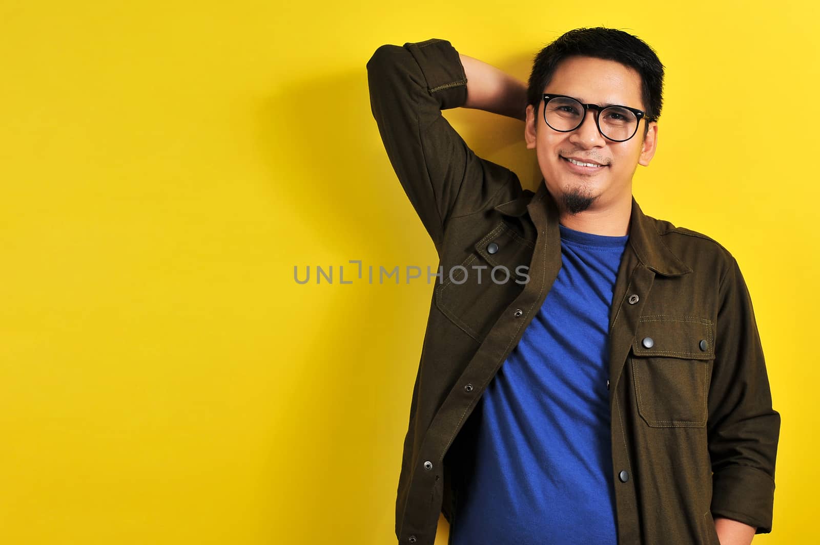 Portrait of a handsome man smile in blue t-shirt, jacket and eye by heruan1507