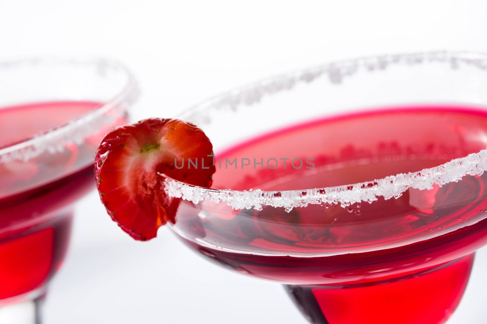 Strawberry cocktail drink in glass isolated on white background