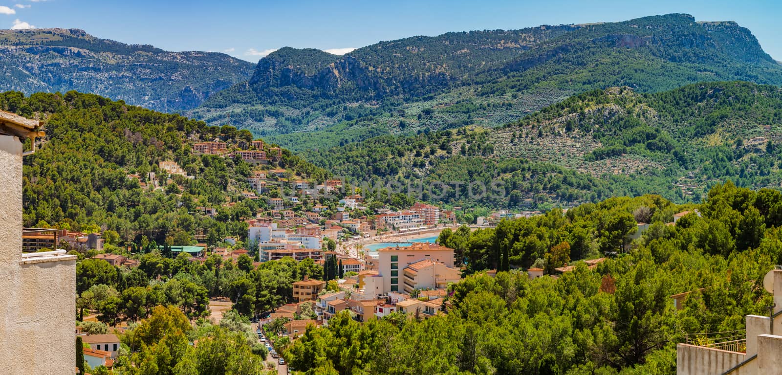 Aerial panoramic view of Port de Soller Mallorca with beautiful mountain scenery of Sierra de Tramuntana