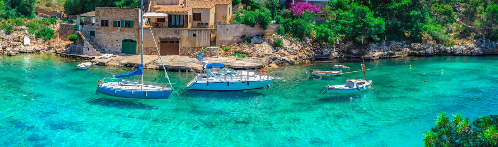 Panoramic view of luxury boats at coast of Cala Figuera on Mallorca, Mediterranean Sea