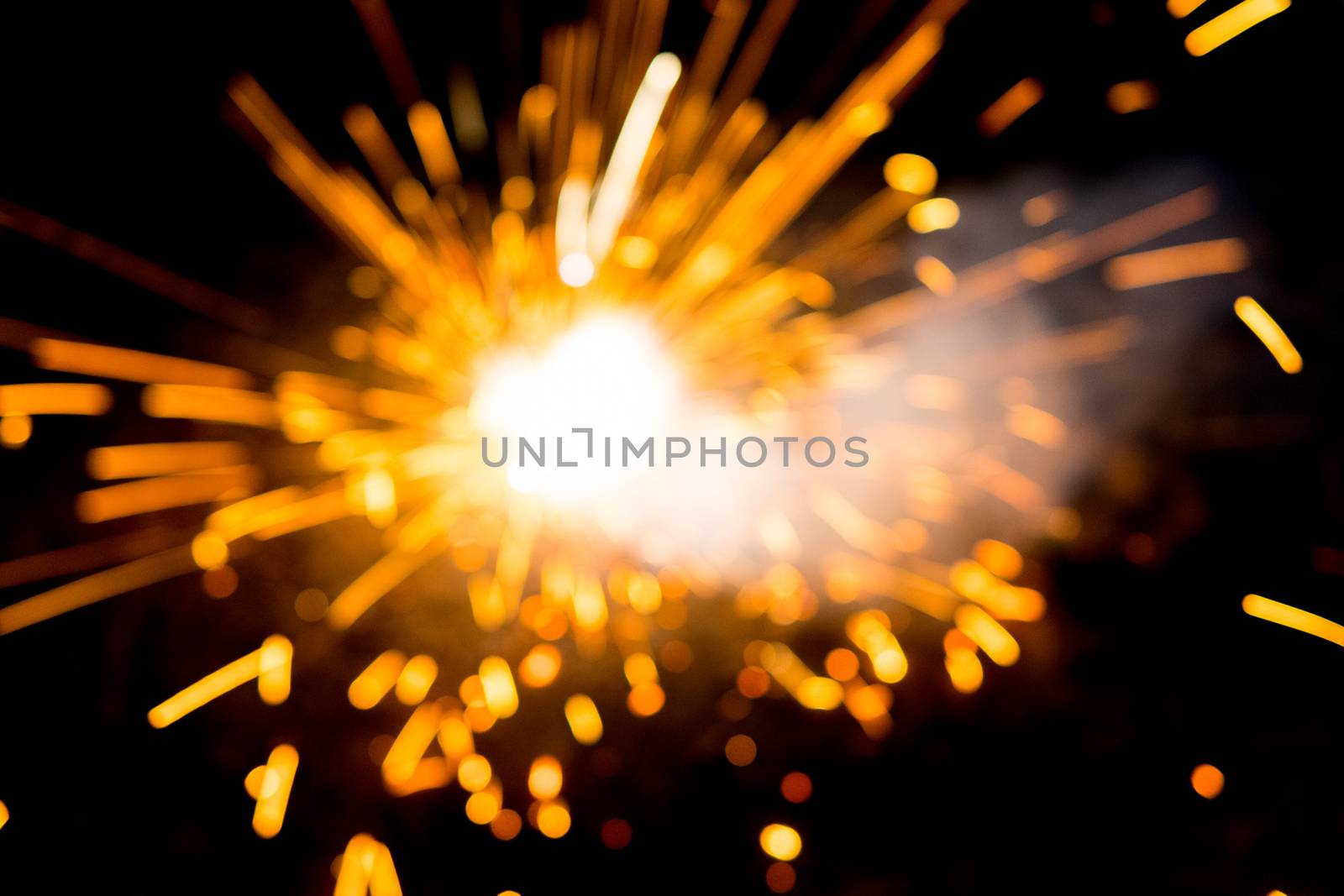 blur sparks from yellow firecrackers