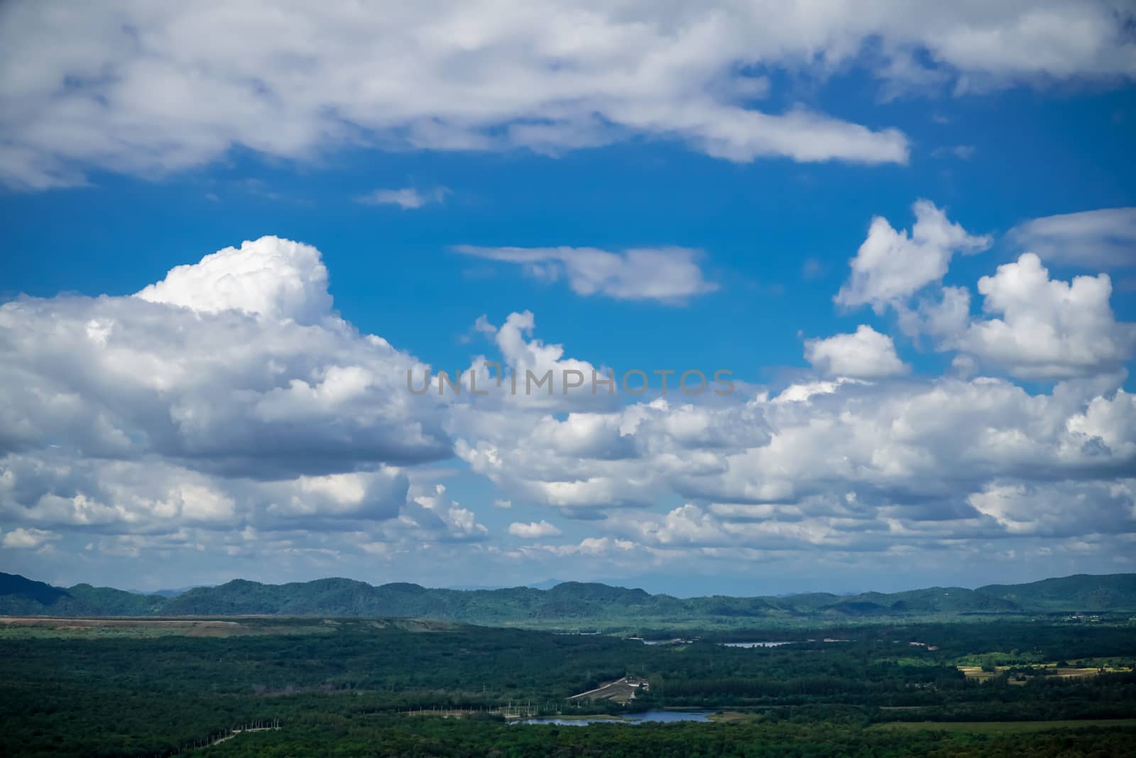 Cloudy skies and mountains in the moist forest