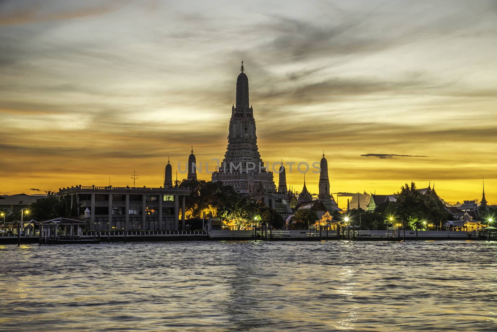 Wat Arun Ratchawararam at evening in Bangkok Thailand.