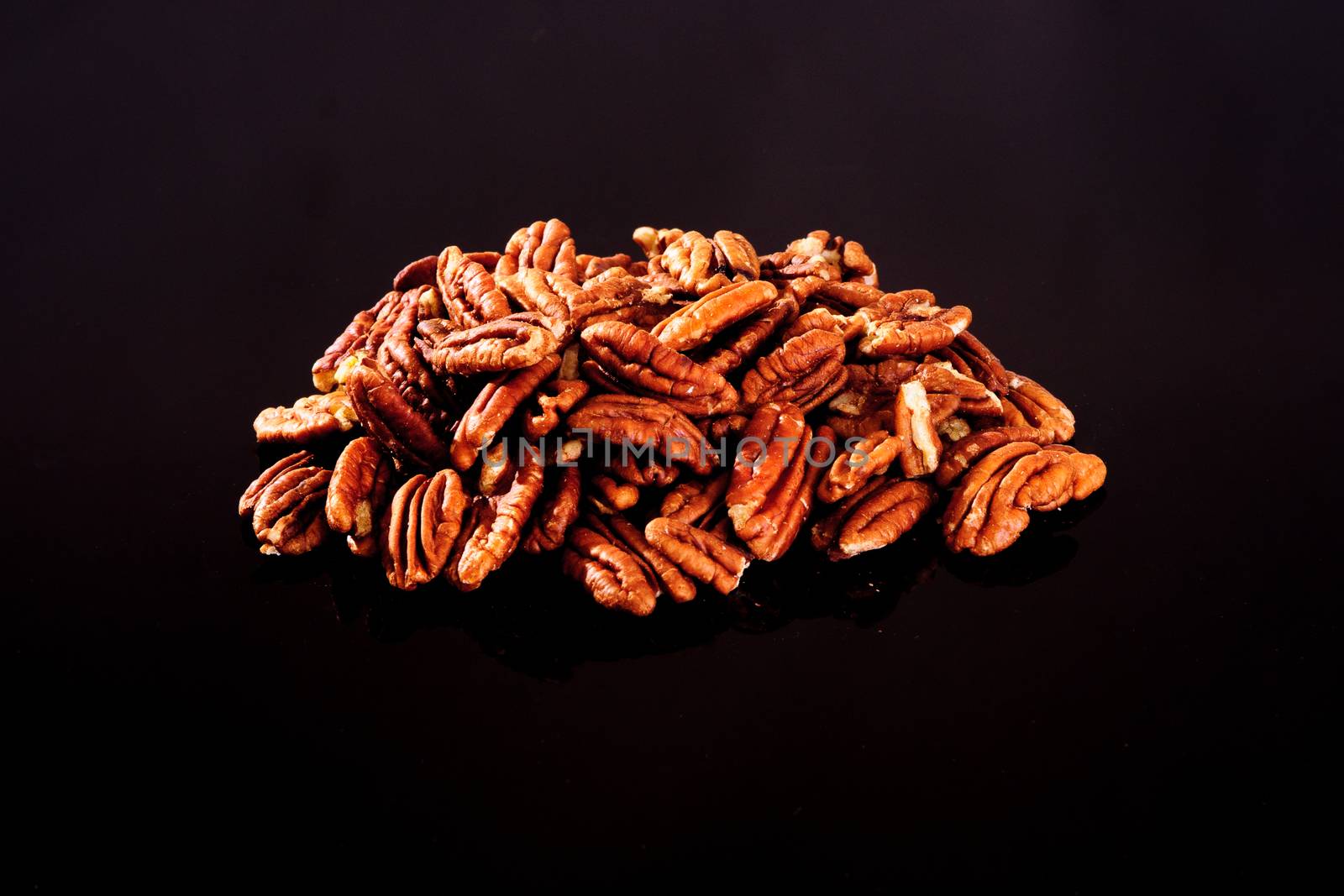 Pecan Nuts on a black background