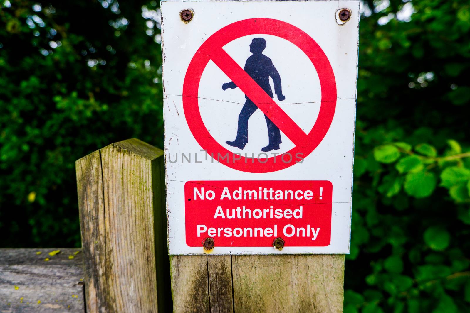 Strictly no admittance to unauthorised persons on wooden gate post by paddythegolfer