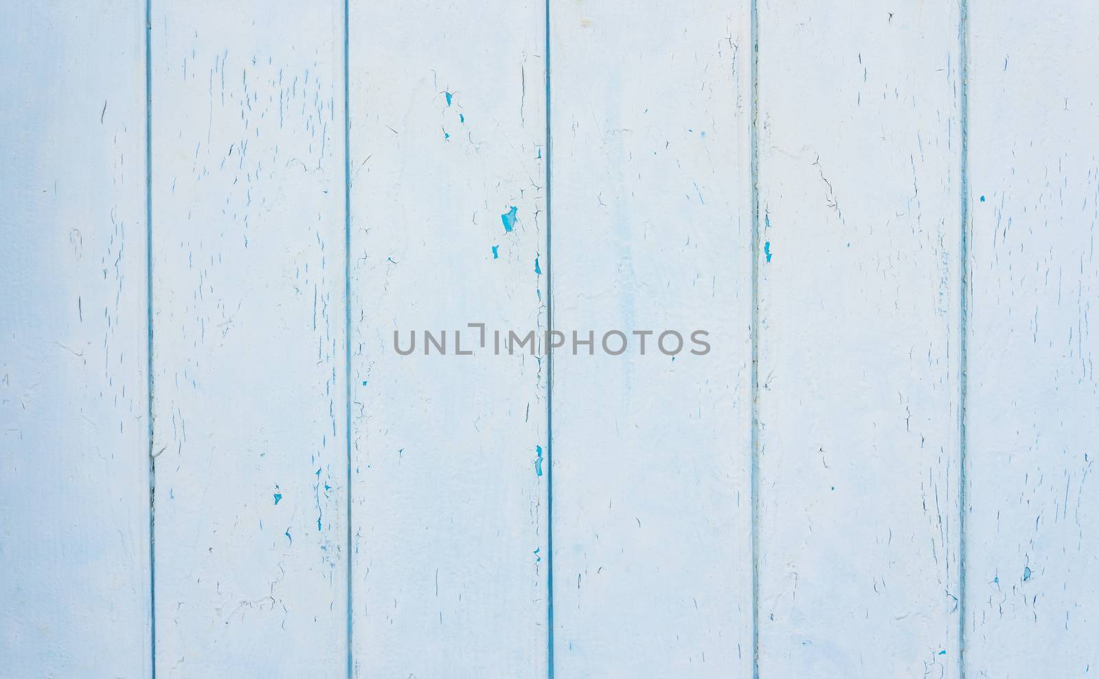 Weathered light blue wooden planks background texture