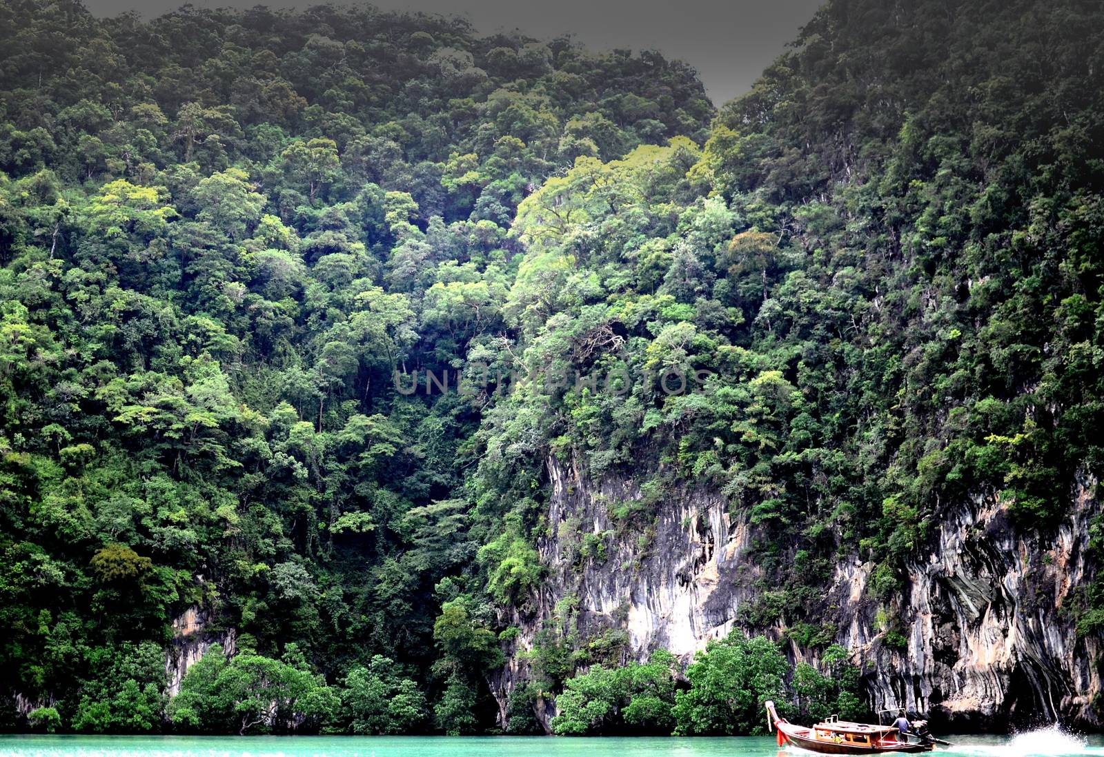 The Big duo mountain has above the boat on the sea krabi island thailand.