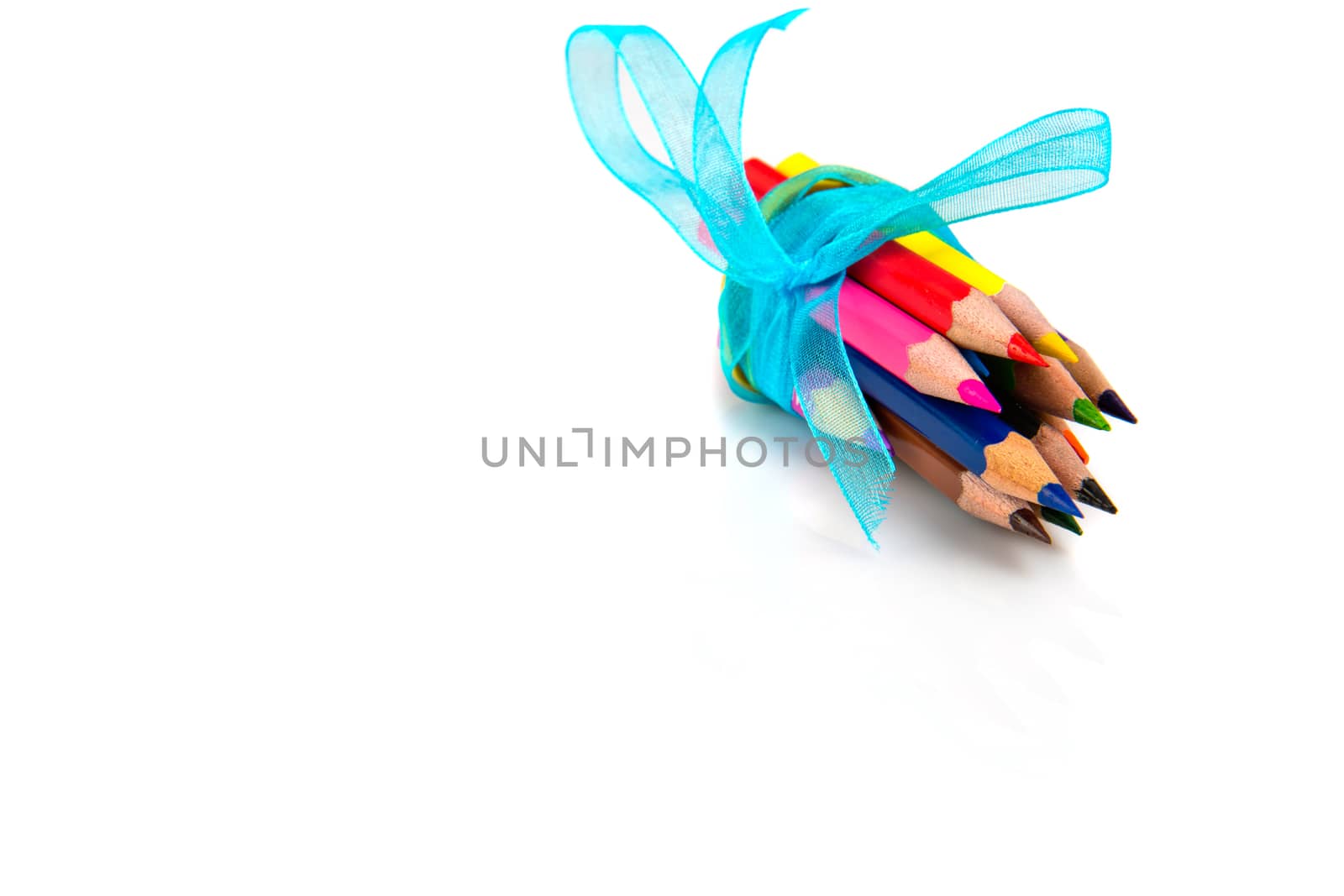 Multicolored pencils isolated on white background.