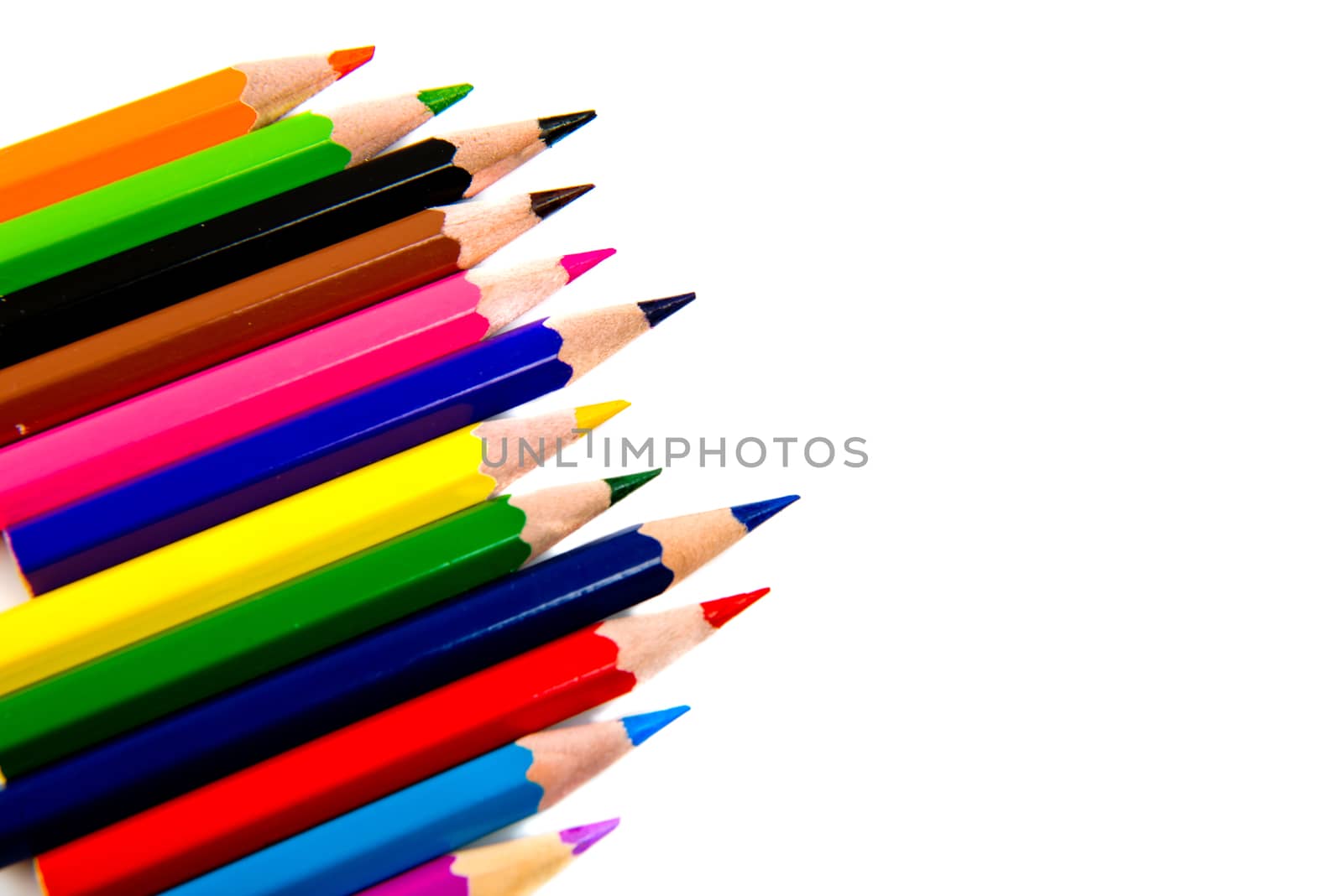 Multicolored pencils isolated on white background.
