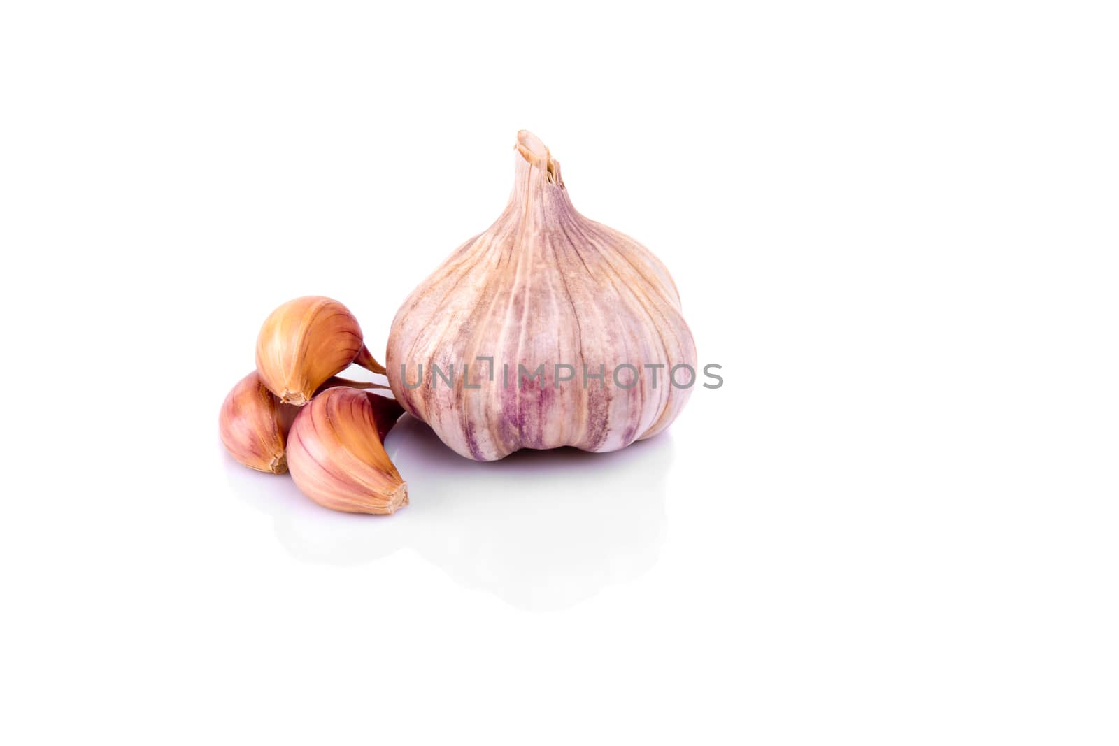 Garlic isolated on white background with reflection.