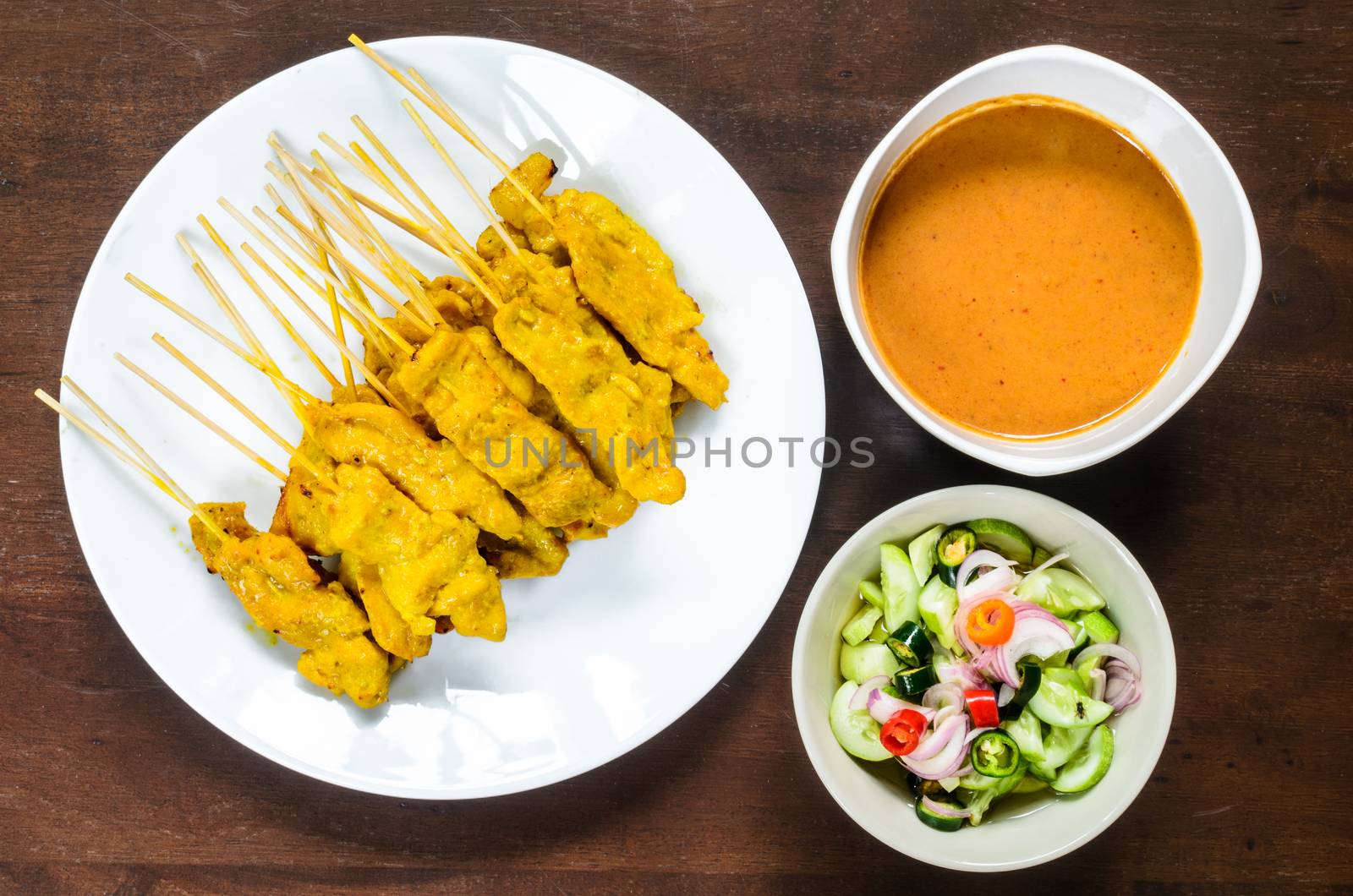 Pork Satay Set has cooked and preparing to enjoying for lunch on the wood table.