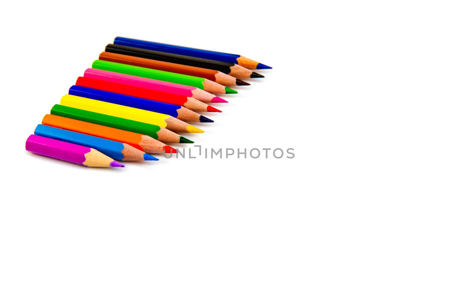 Multicolored pencils isolated on white background. School supplies.