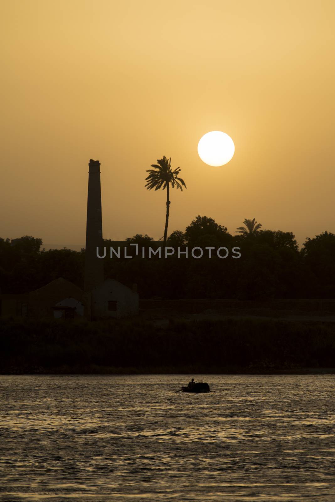River bank silhouette at dusk sunset by paulvinten