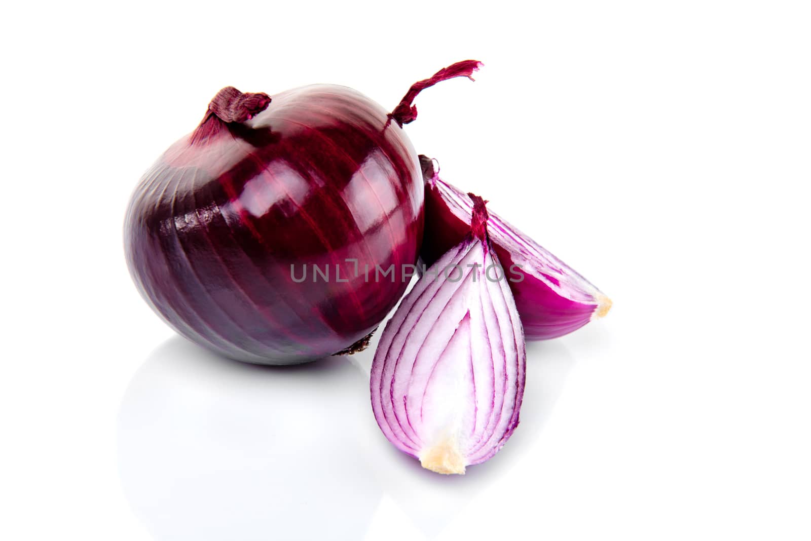 Red onion and half slice on white isolated background with reflect.