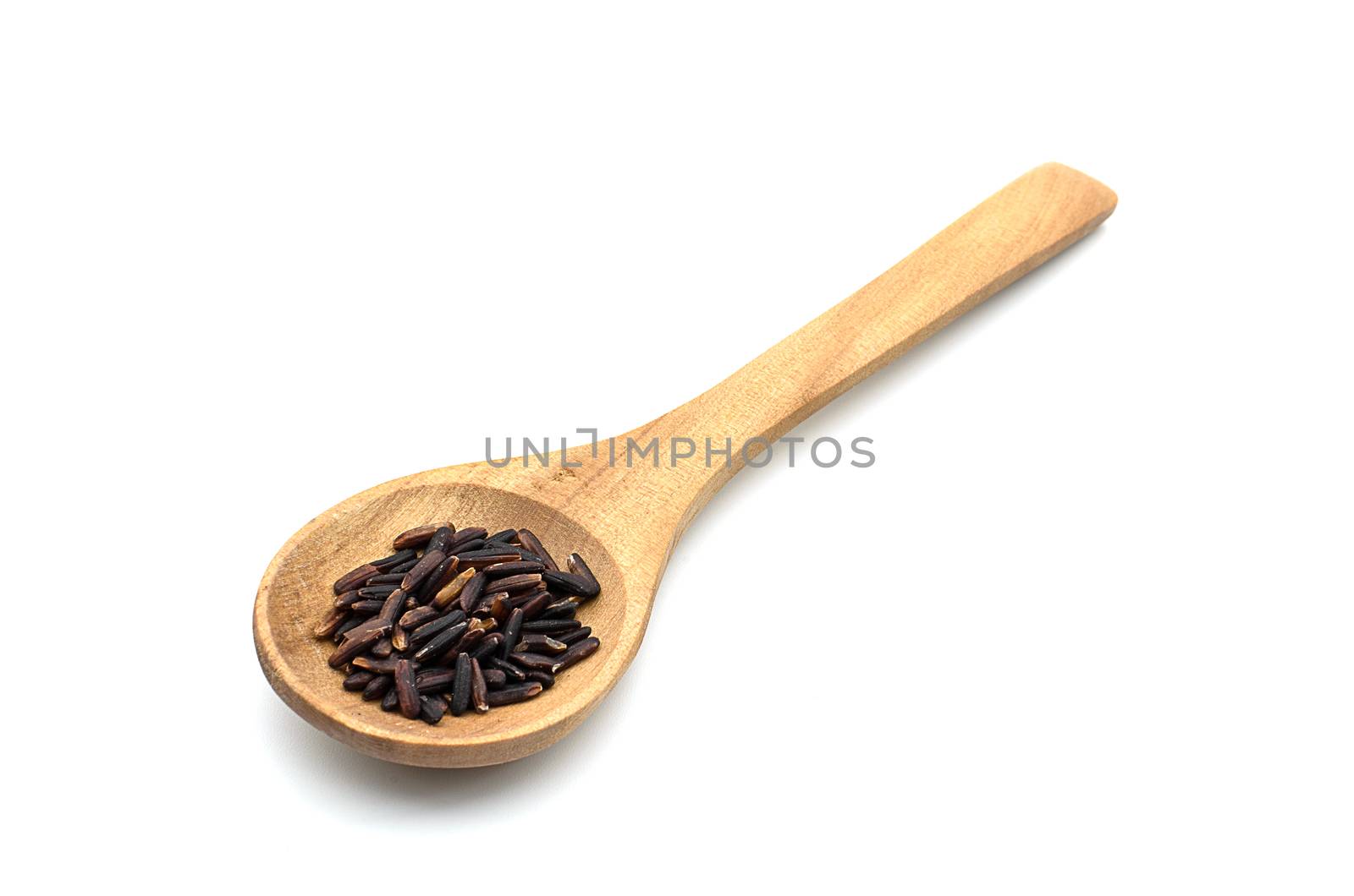 The Rice Berry on Wood Spoon with isolated on white.