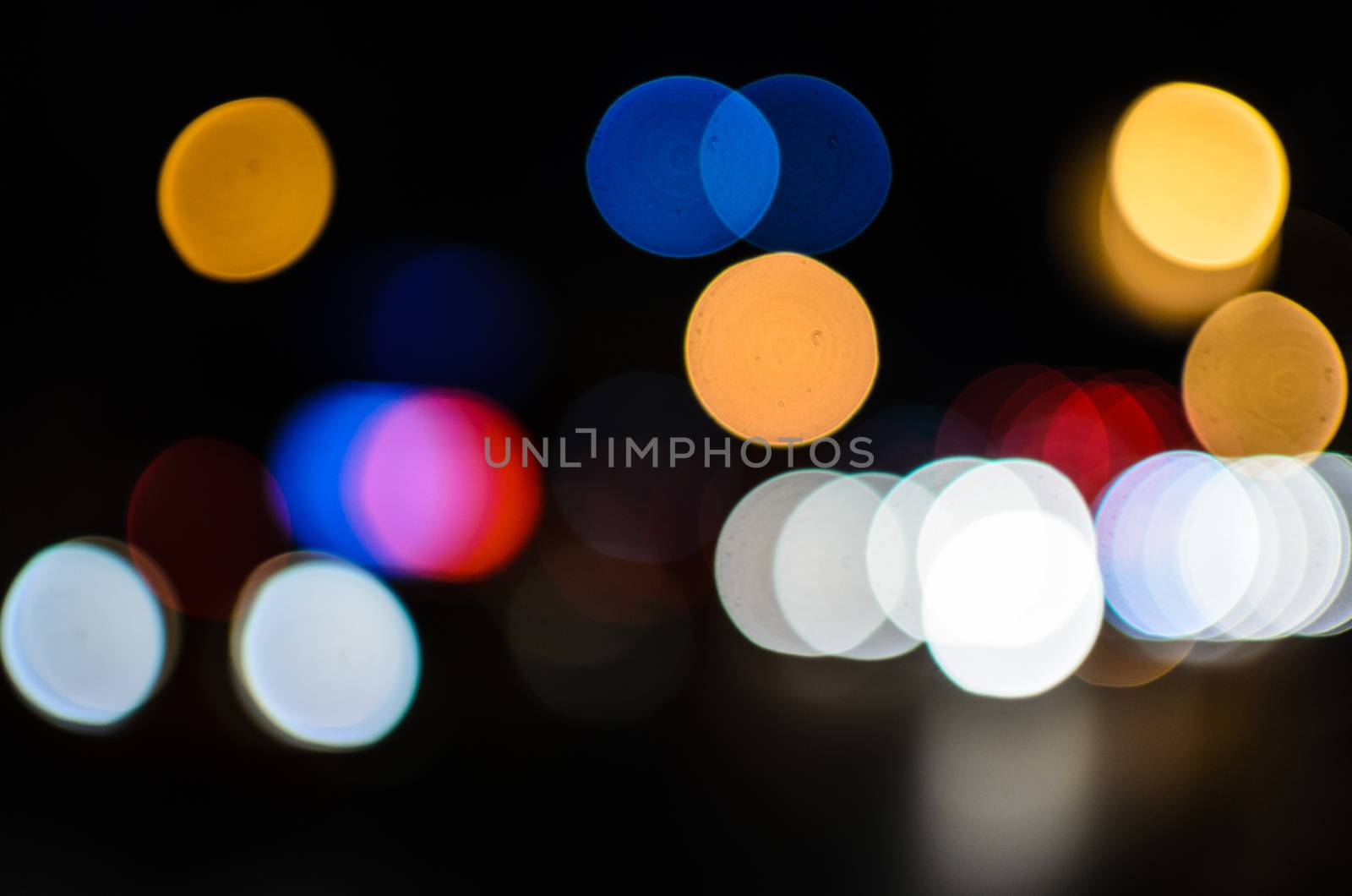 Abstract Light Bokeh Background in the Dark.