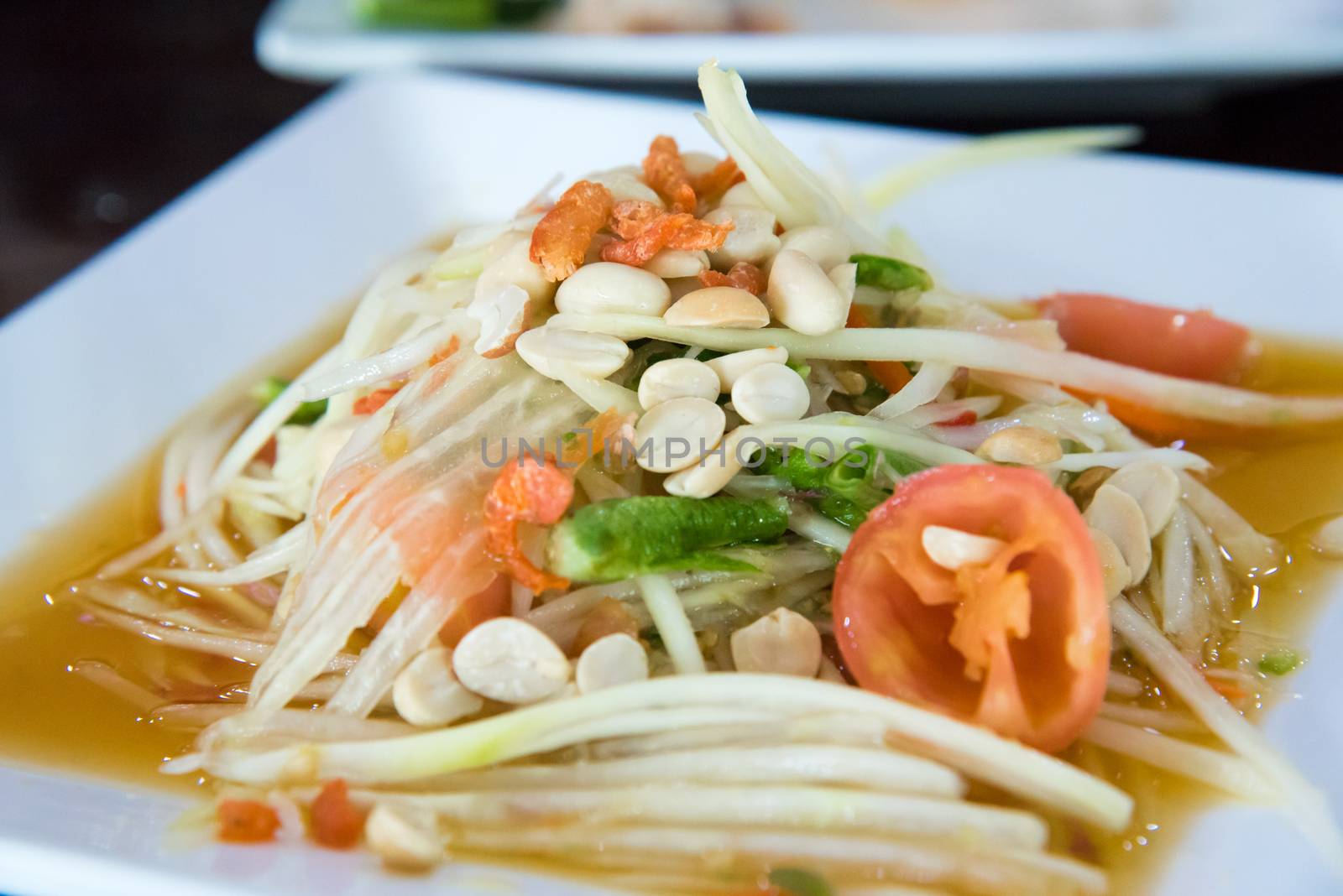 Papaya Salad is thai food.