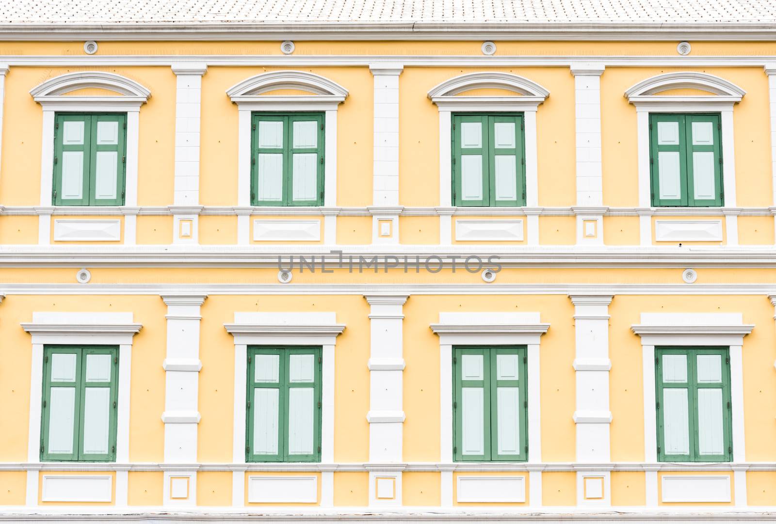 Grenn and Yellow Vintage Windows Pattern and wallpaper has architecture in Bangkok Thailand.