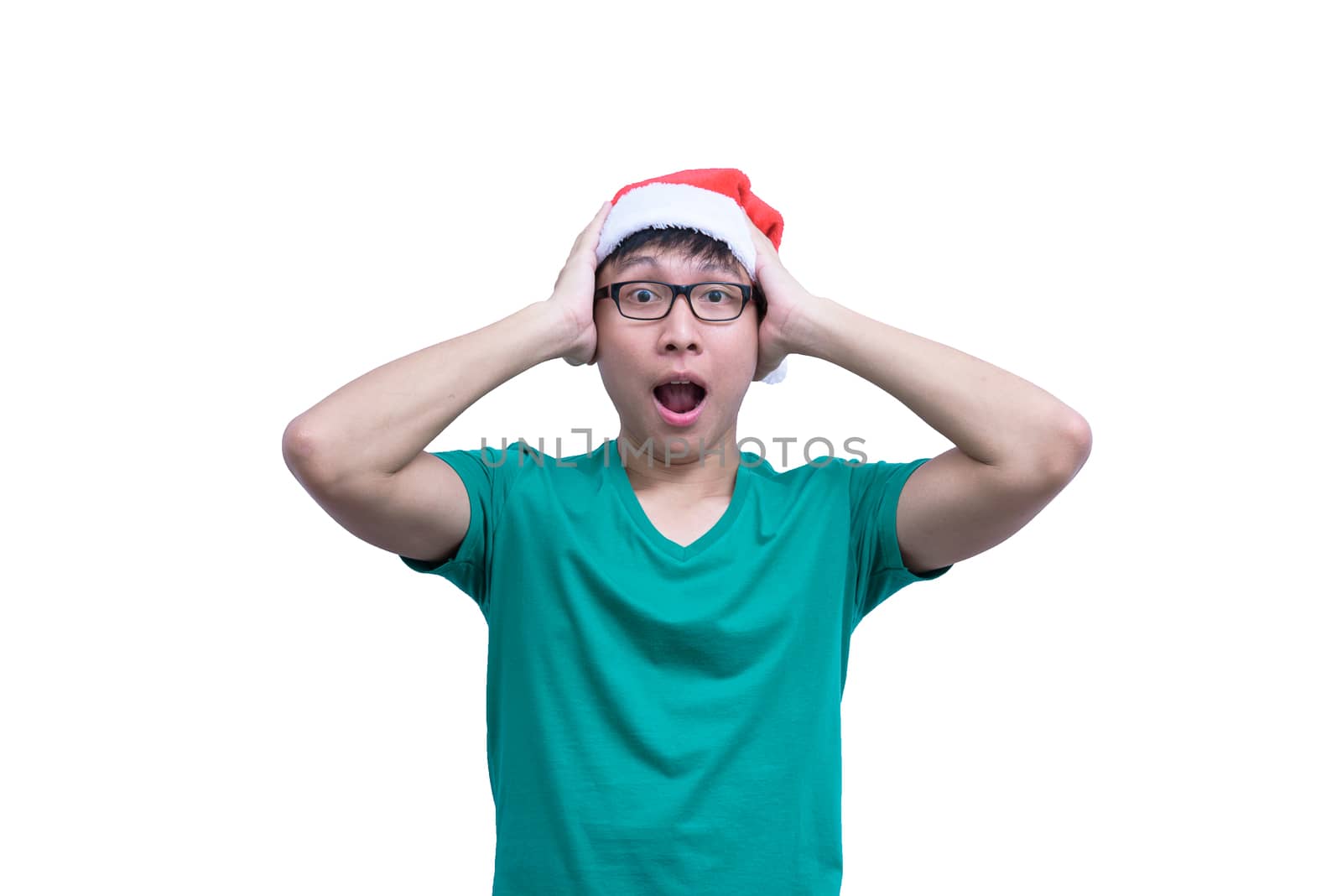 Asian Santa Claus man with eyeglasses and green shirt has feeling like a really surprise and shock isolated on white background with copy space.