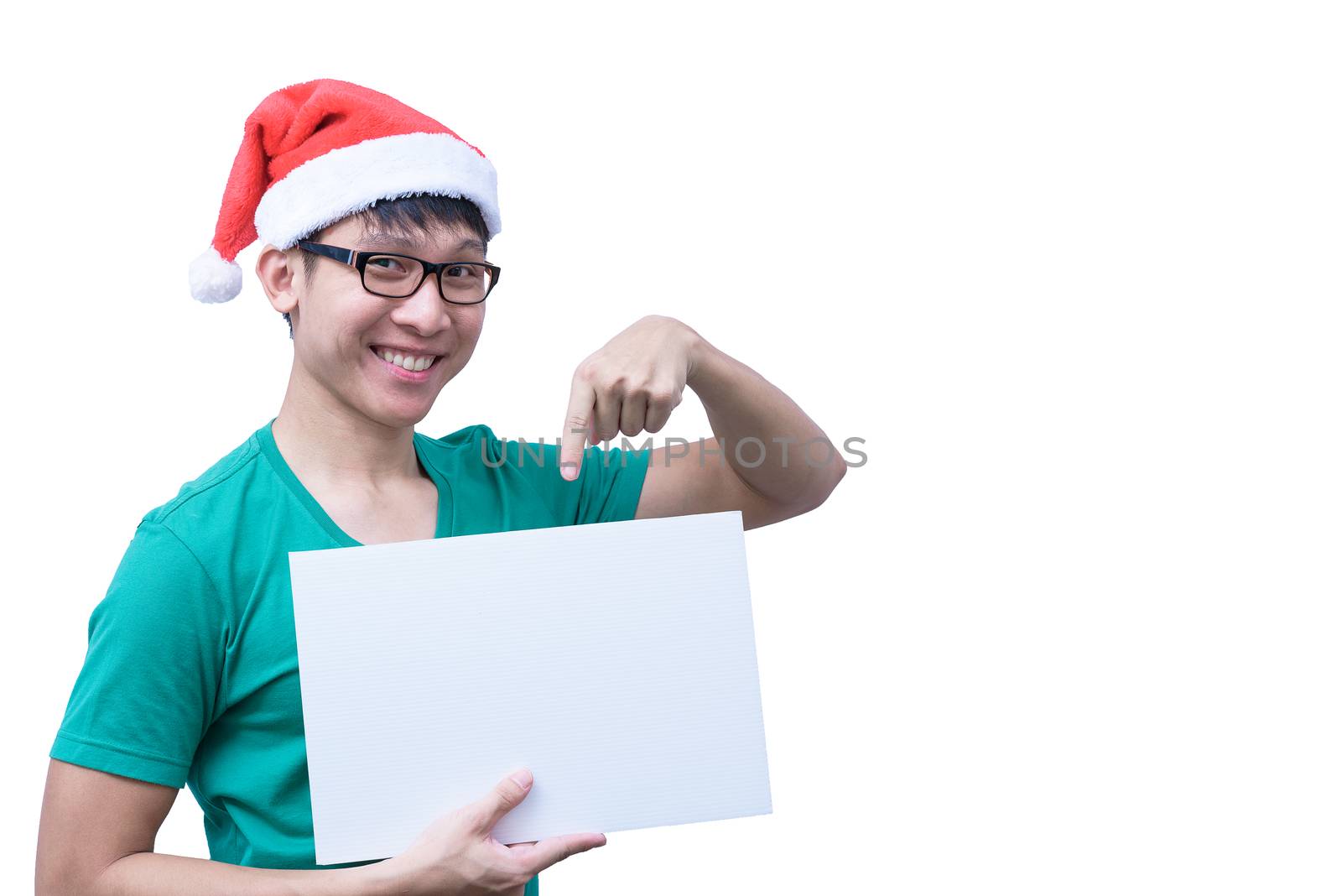 Asian Santa Claus man with eyeglasses and green shirt has holding a white blank advertisement banner isolated on white background with copy space.