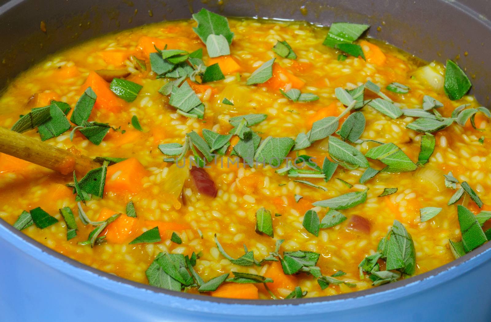 Risotto, an Italian rice dish, made with pumpkin and sage
