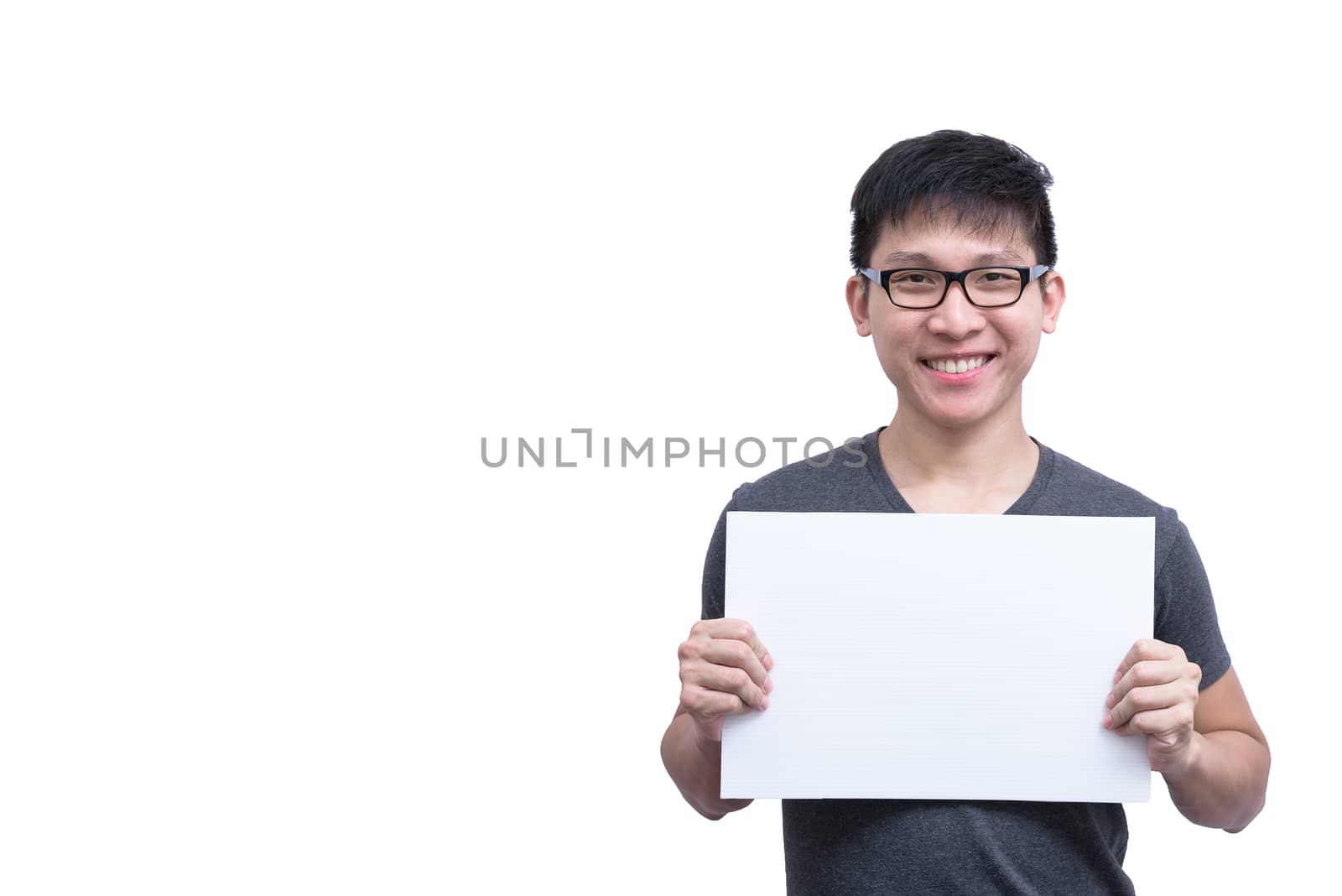 Asian man with eyeglasses and grey shirt has holding a white blank advertisement banner isolated on white background with copy space.