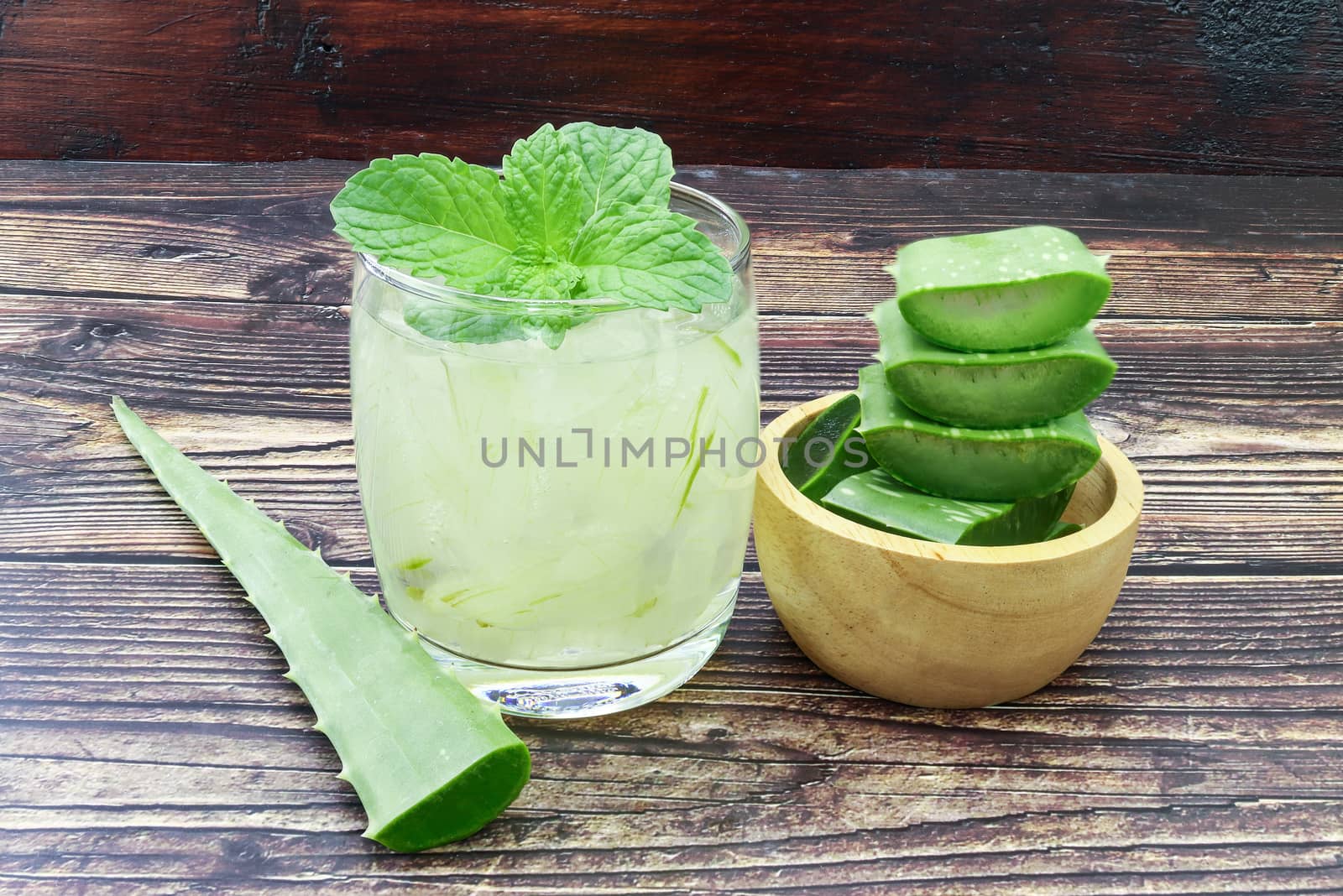 Aloe Vera for drinking on wood table 