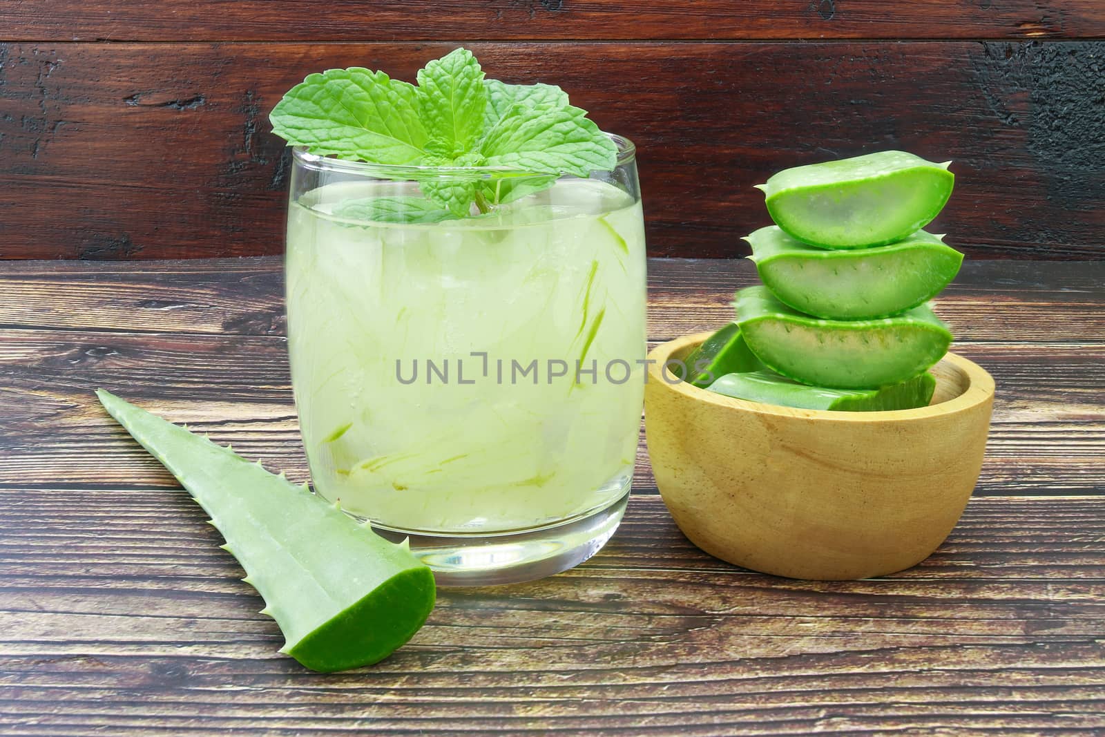 Aloe Vera for drinking on wood table 