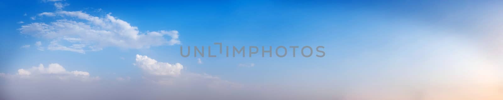 Vibrant color panoramic sky with cloud on a sunny day. Beautiful cirrus cloud. Panorama high resolution photograph.