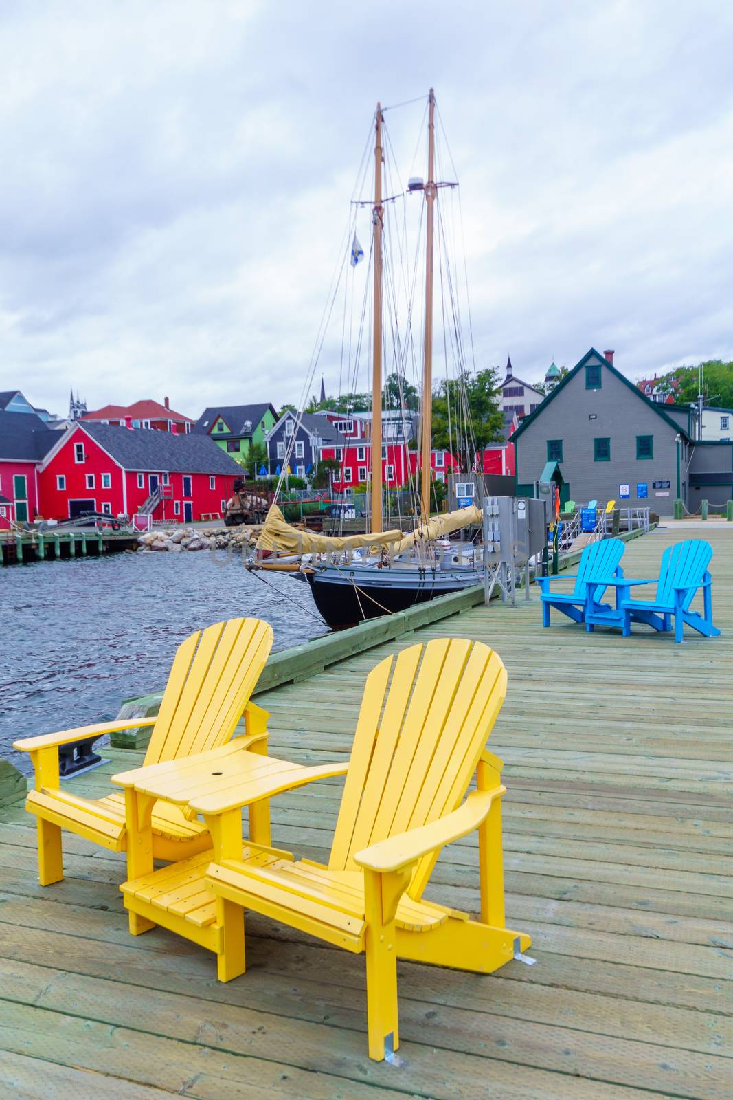 Pier with colorful chairs, in Lunenburg Harbor, Nova Scotia