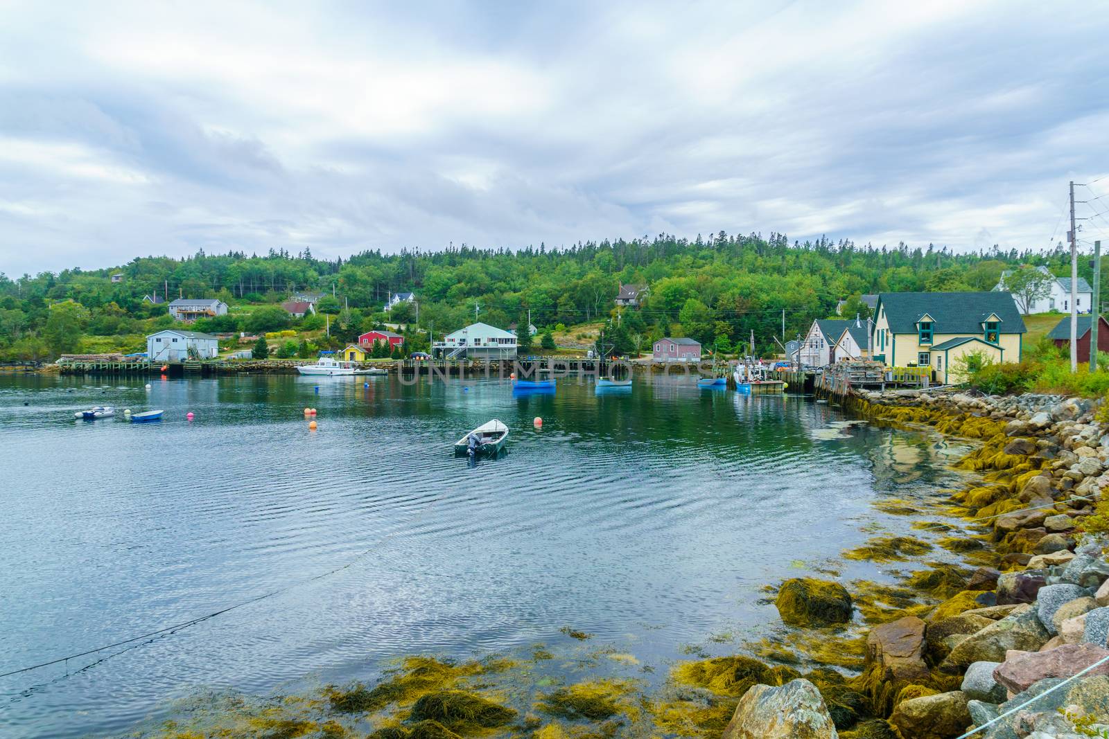 Views of the bay, boats and waterfront buildings in Northwest Cove, Nova Scotia, Canada