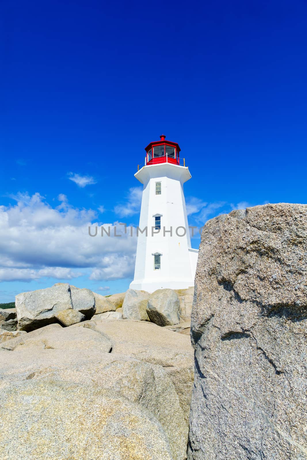 Lighthouse of the fishing village Peggys Cove by RnDmS