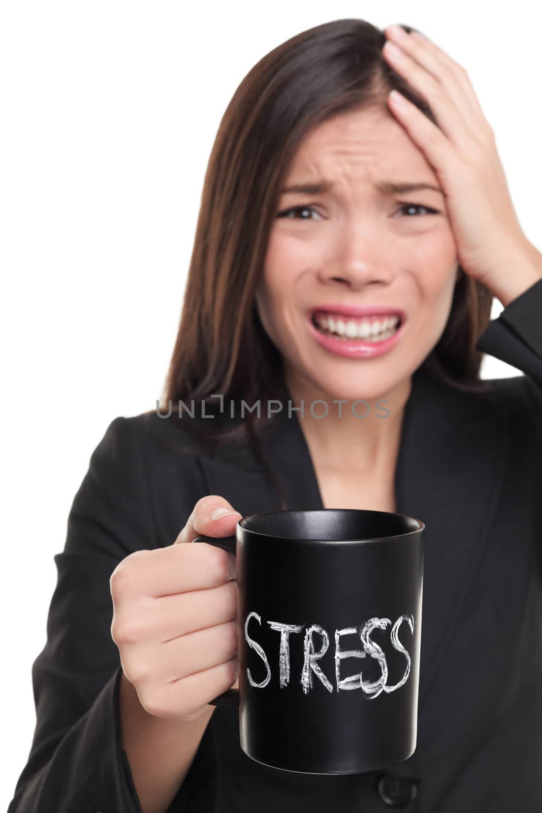 Stressed businesswoman drinking morning stress coffee cup. Stress concept. Business woman stressed in suit holding head addicted to caffeine. Studio isolated on white background by Maridav
