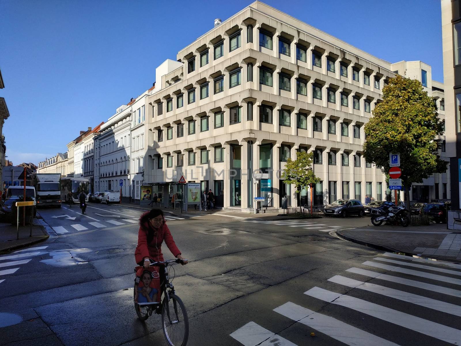 Ghent, Belgium - November 02, 2019: view on the streets and roads with tourists walking around by VIIIPhoto