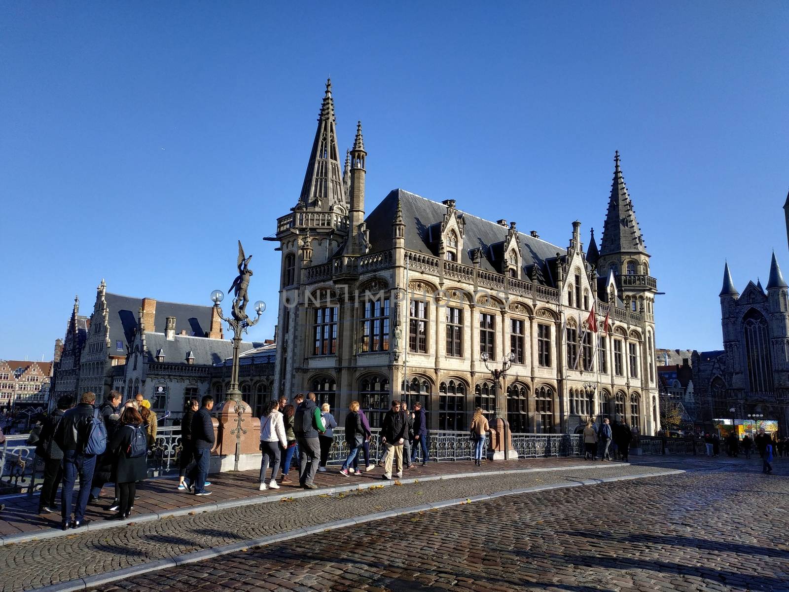 Ghent, Belgium - November 02, 2019: view on the streets and roads with tourists walking around