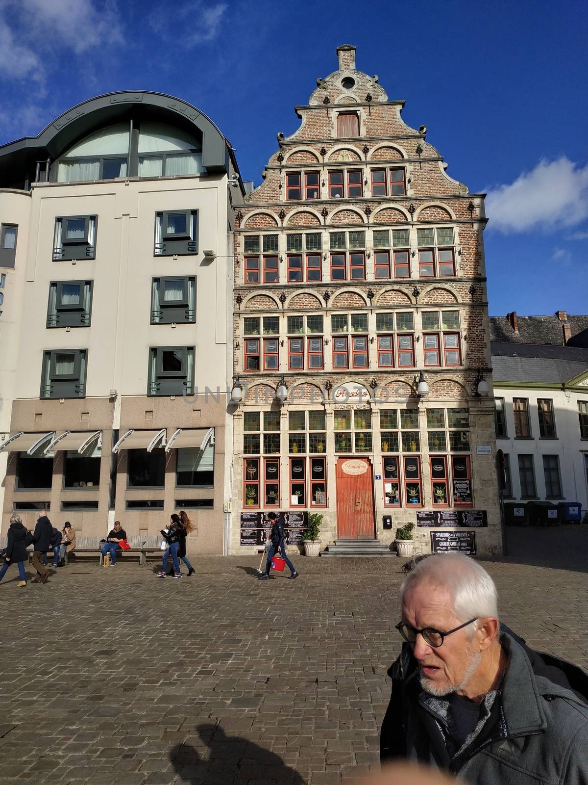 Ghent, Belgium - November 02, 2019: view on the streets and roads with tourists walking around