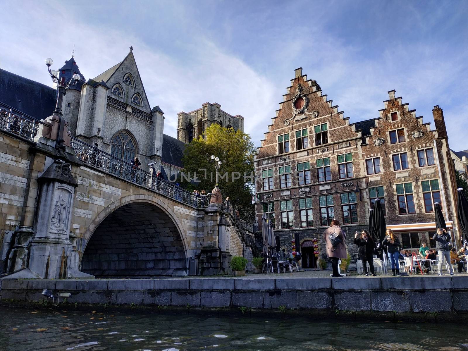 Ghent, Belgium - November 02, 2019: view on the streets and roads with tourists walking around