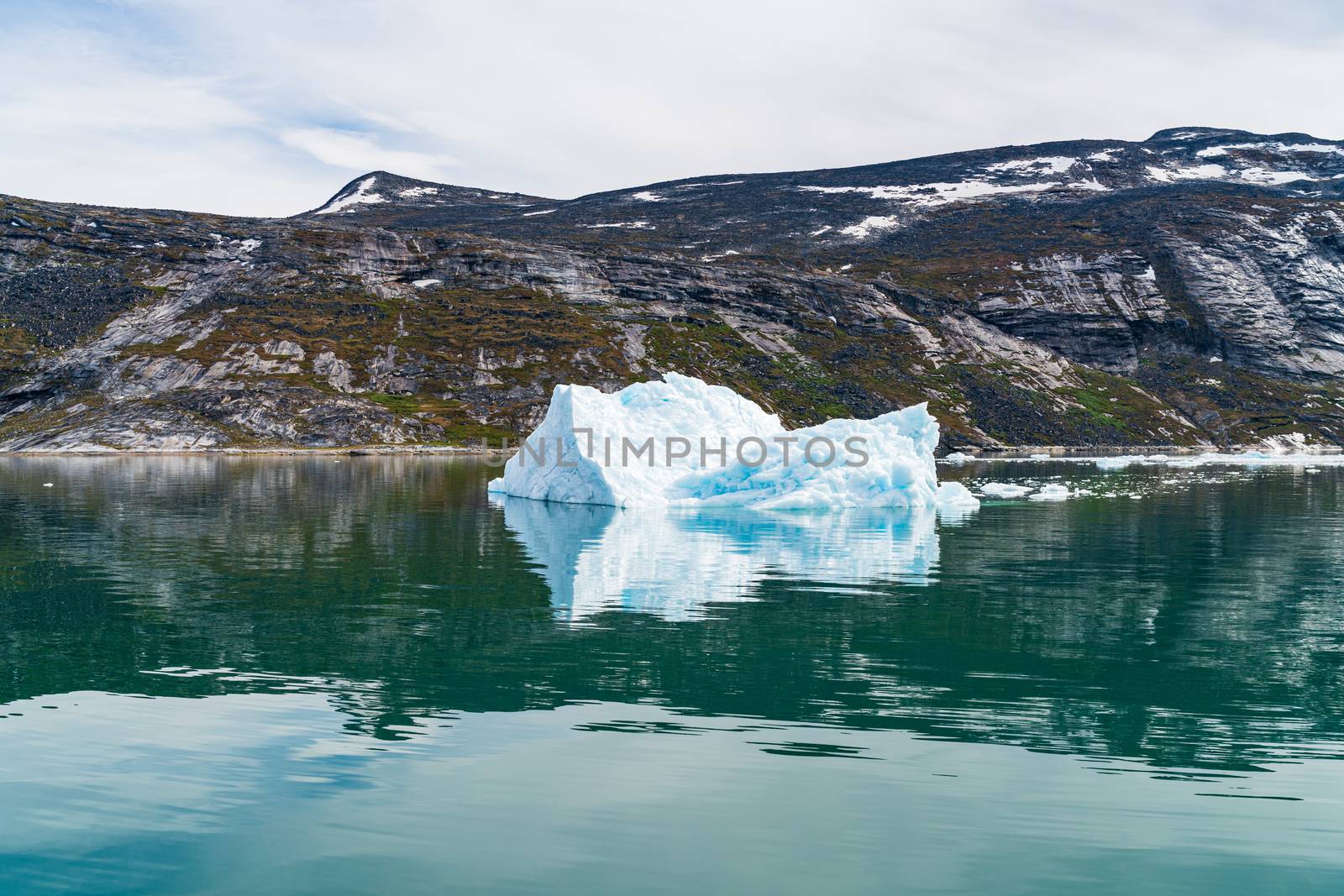Photo of Iceberg and ice from glacier in nature landscape Greenland by Maridav