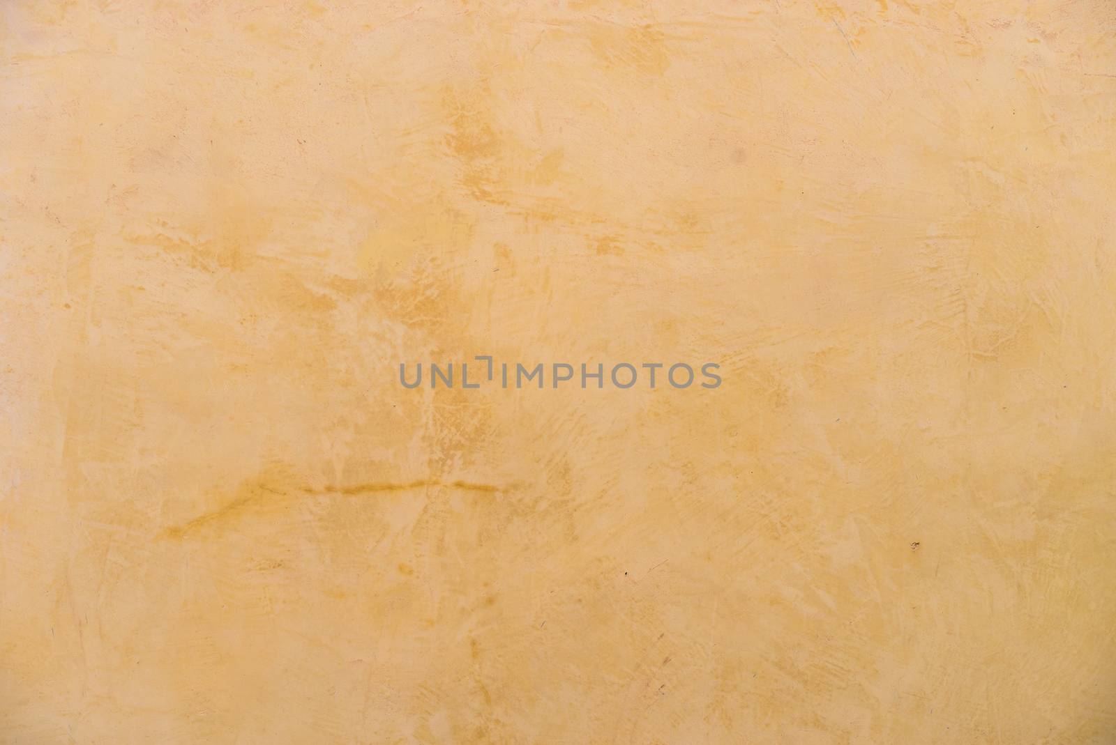 Beige brown wall plaster background texture with copy space