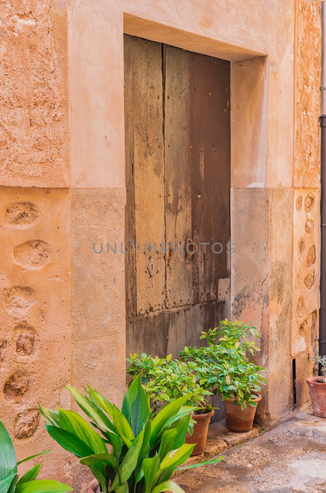 Close-up of old wooden front door residence entrance