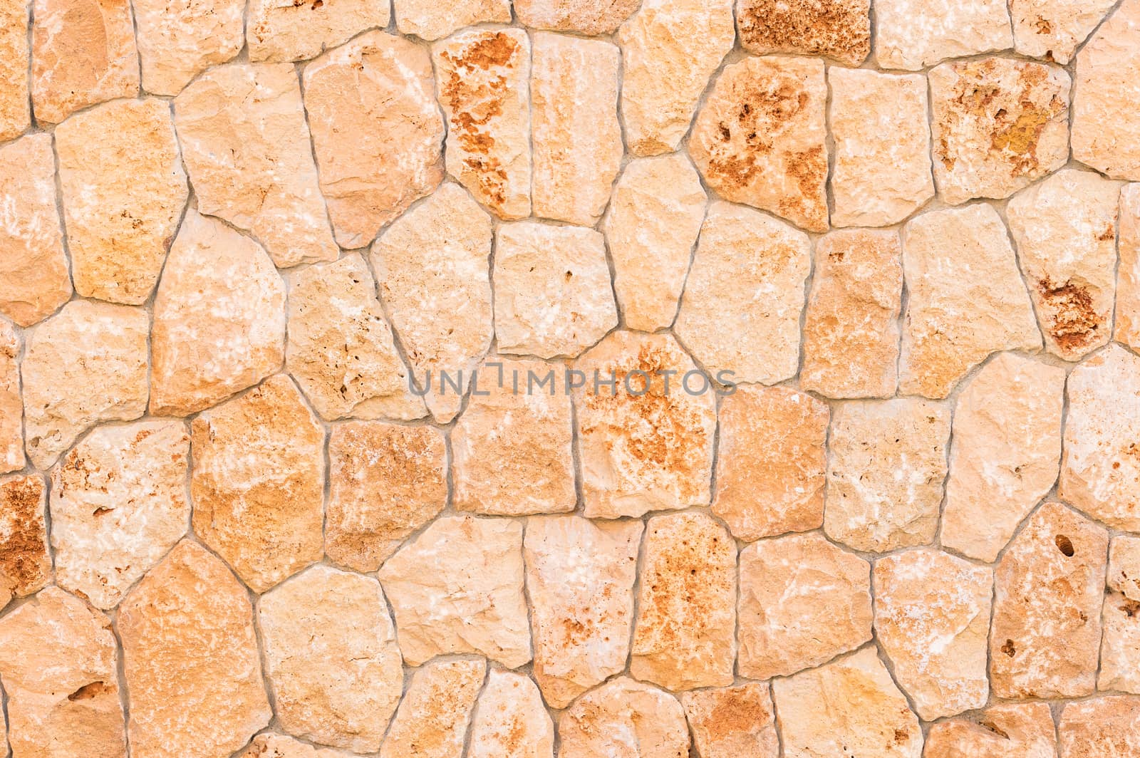 Natural stone wall background structure, close up