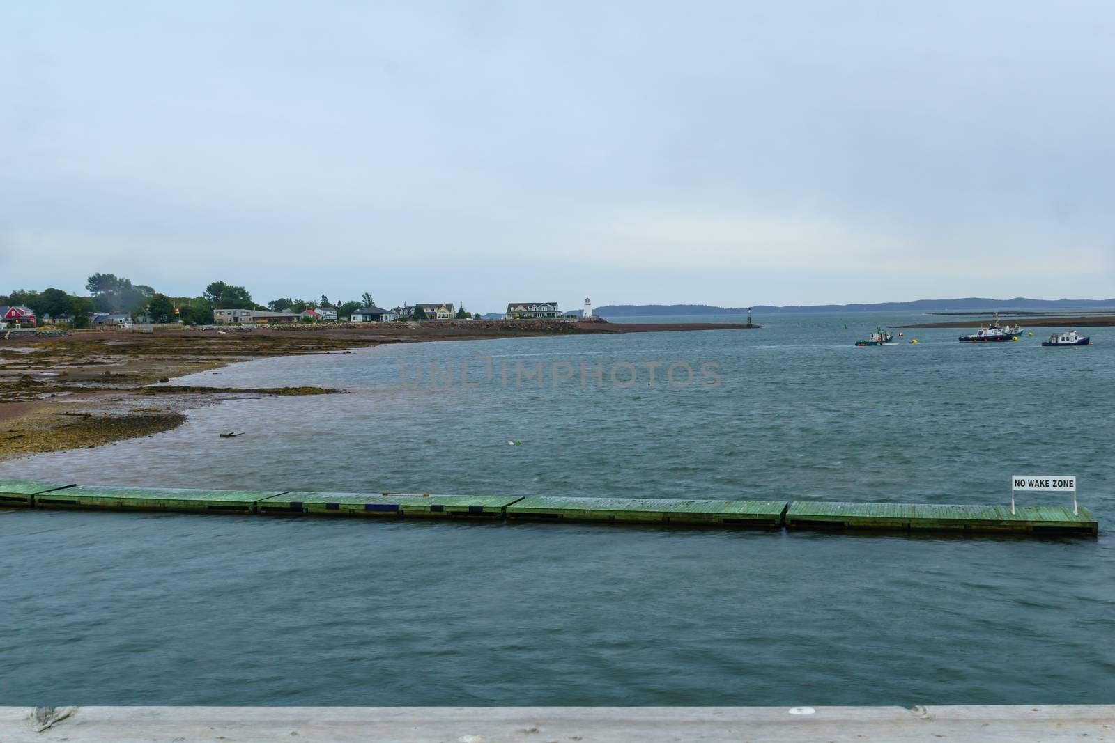 View of Saint Andrews coast, waterfront and lighthouse at low tide. New Brunswick, Canada