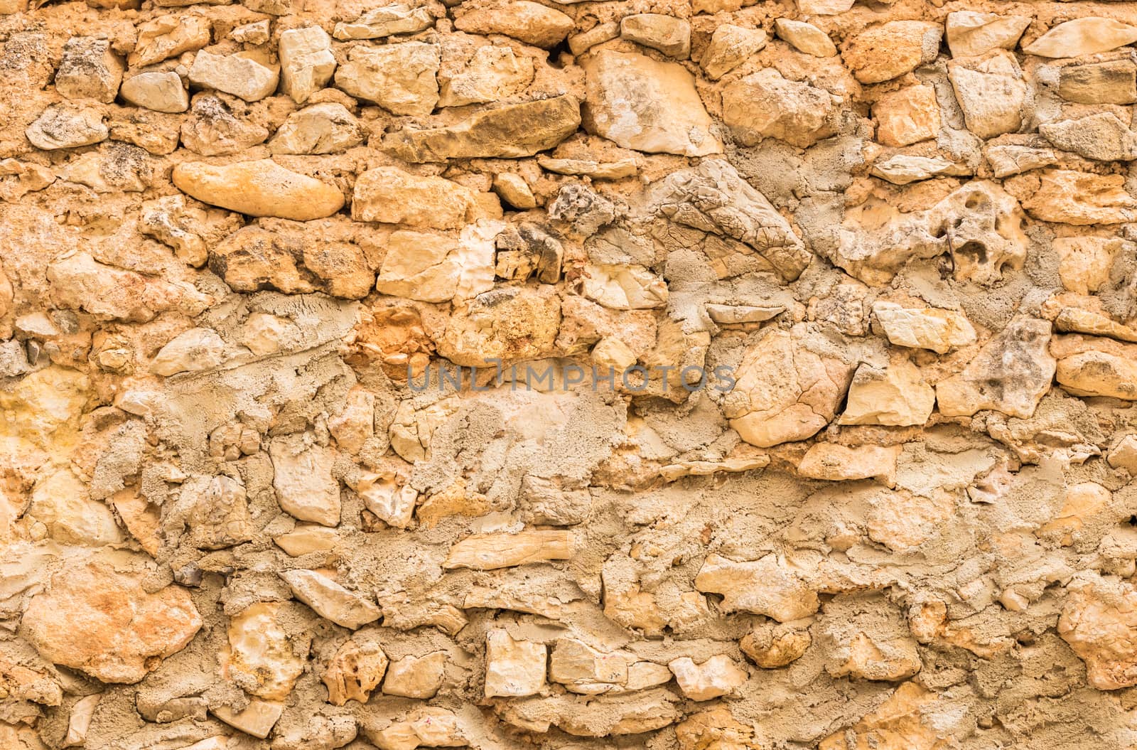 Old stone wall background texture, structure close-up

