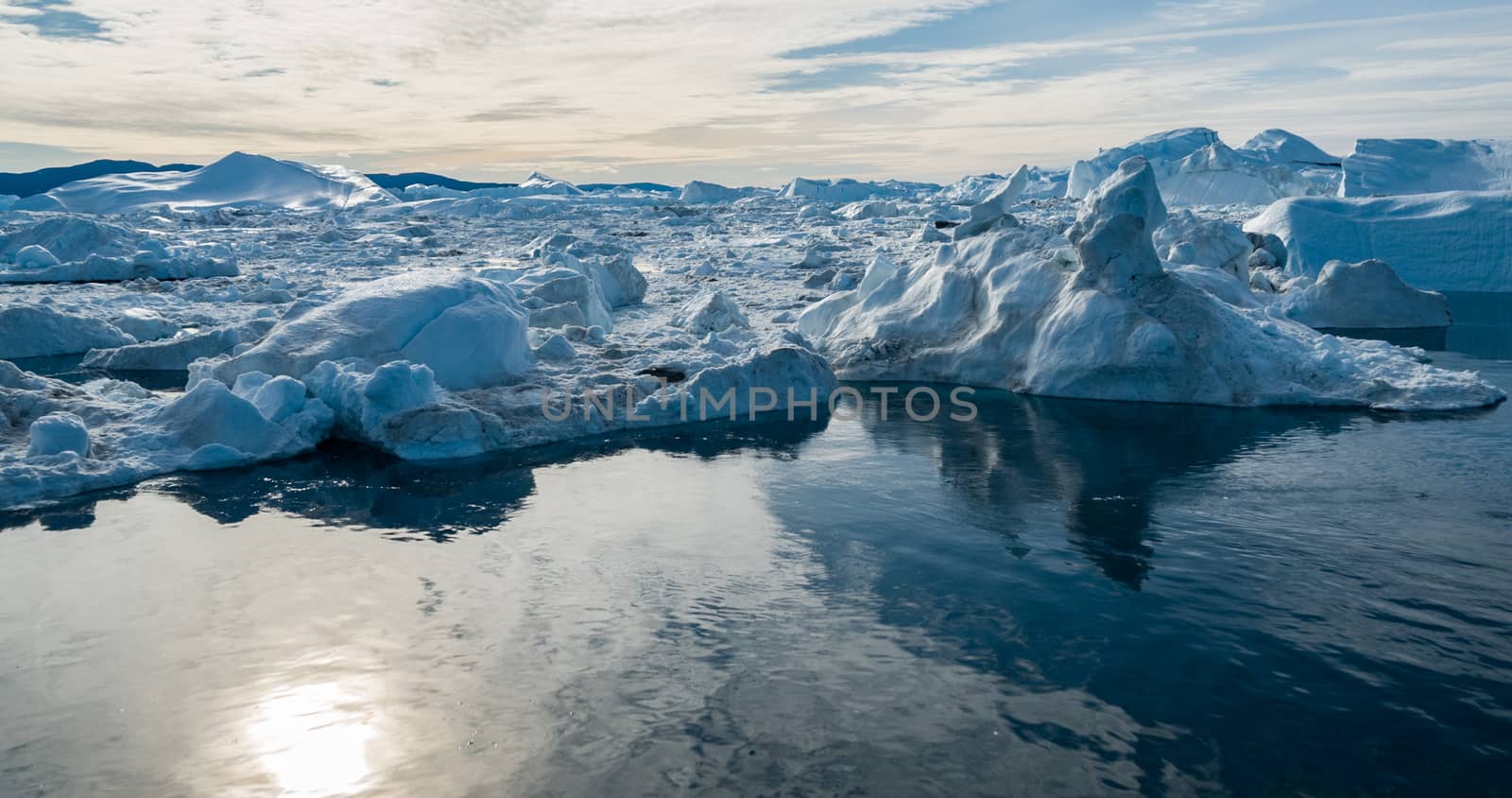 Drone photo of Iceberg and ice from glacier in nature landscape Greenland by Maridav