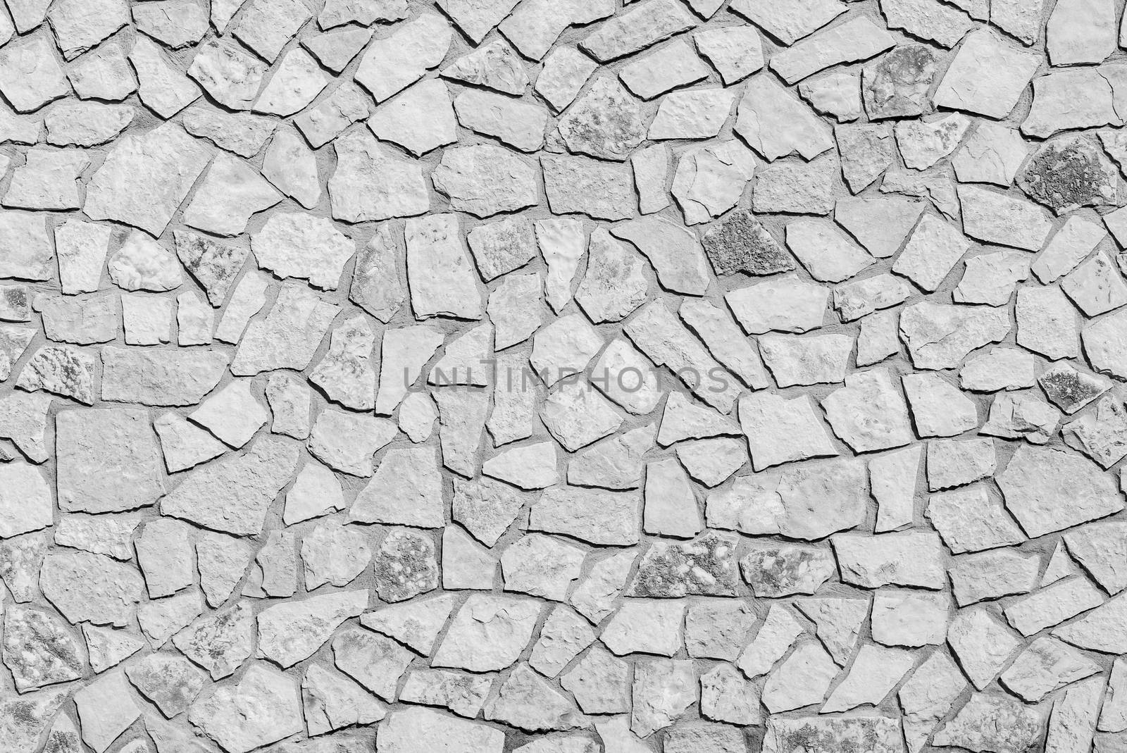 Natural stone wall background structure, close up