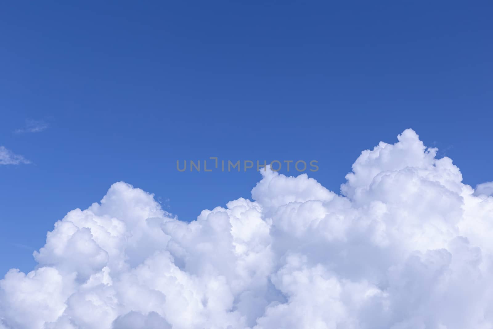 Blue sky background with white clouds on sunny day by phanthit