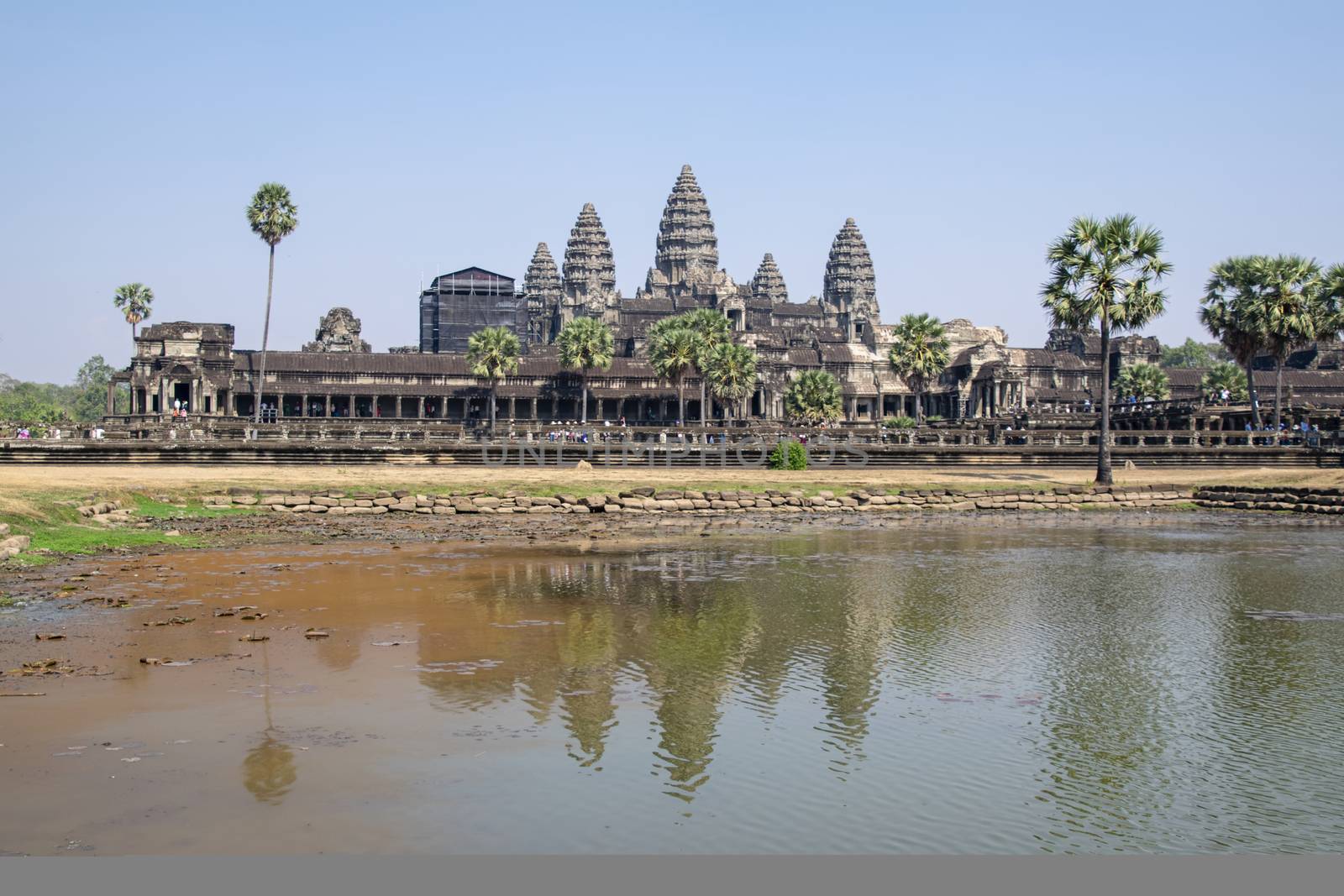 Angkor Wat, Cambodia - March 2016: View of the main temple at Angkor wat. Originally constructed in the early 12th century, the ruins are a huge tourist attraction as well as a place of worship today