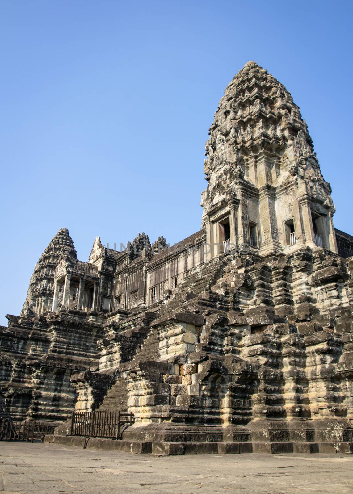 Angkor Wat, Cambodia - March 2016: View of the main temple at Angkor wat. Originally constructed in the early 12th century, the ruins are a huge tourist attraction as well as a place of worship today