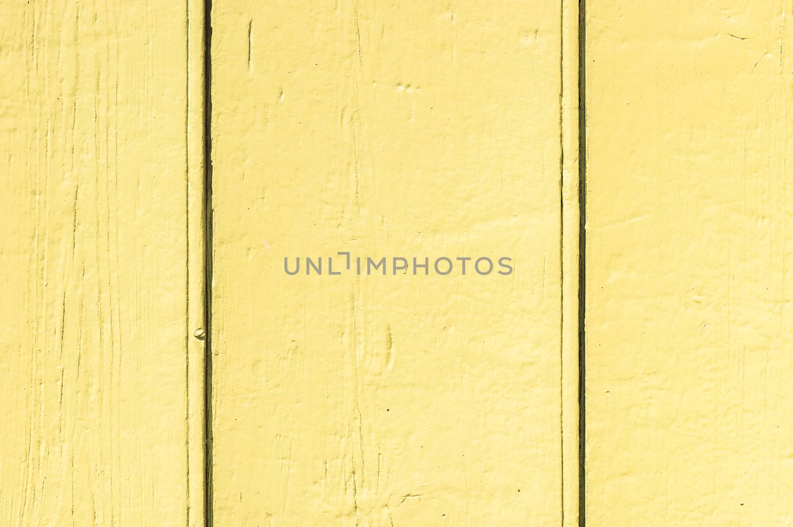 Yellow painted wood planks background texture with copy space